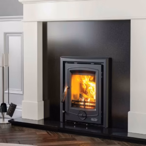 Achill 7kW multi fuel insert stove shown fitted within a fireplace surround