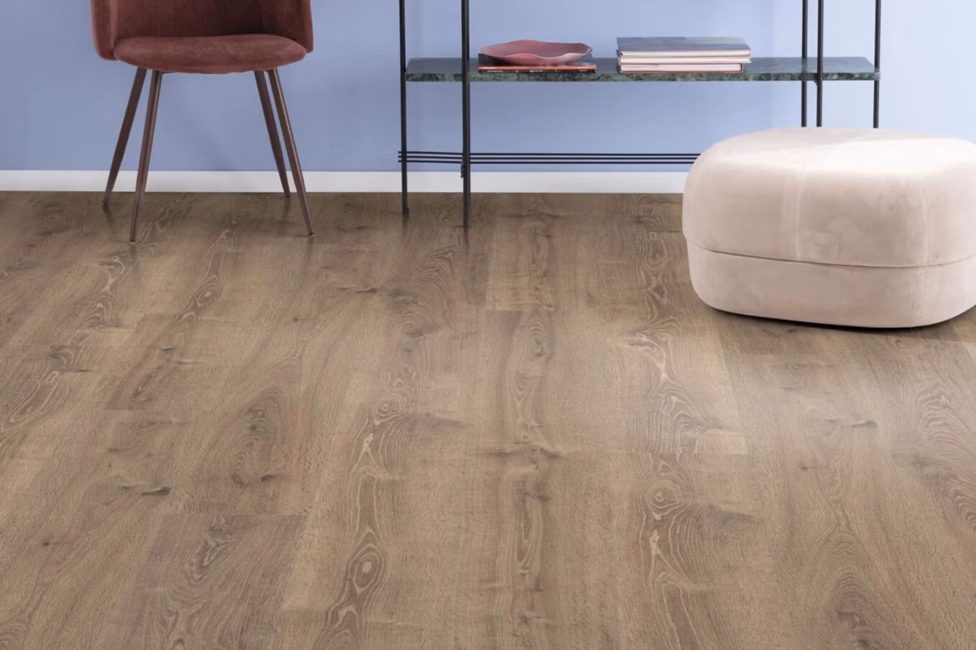Grey Bayford Oak Aqua laminate flooring shown in a contemporary room setting.