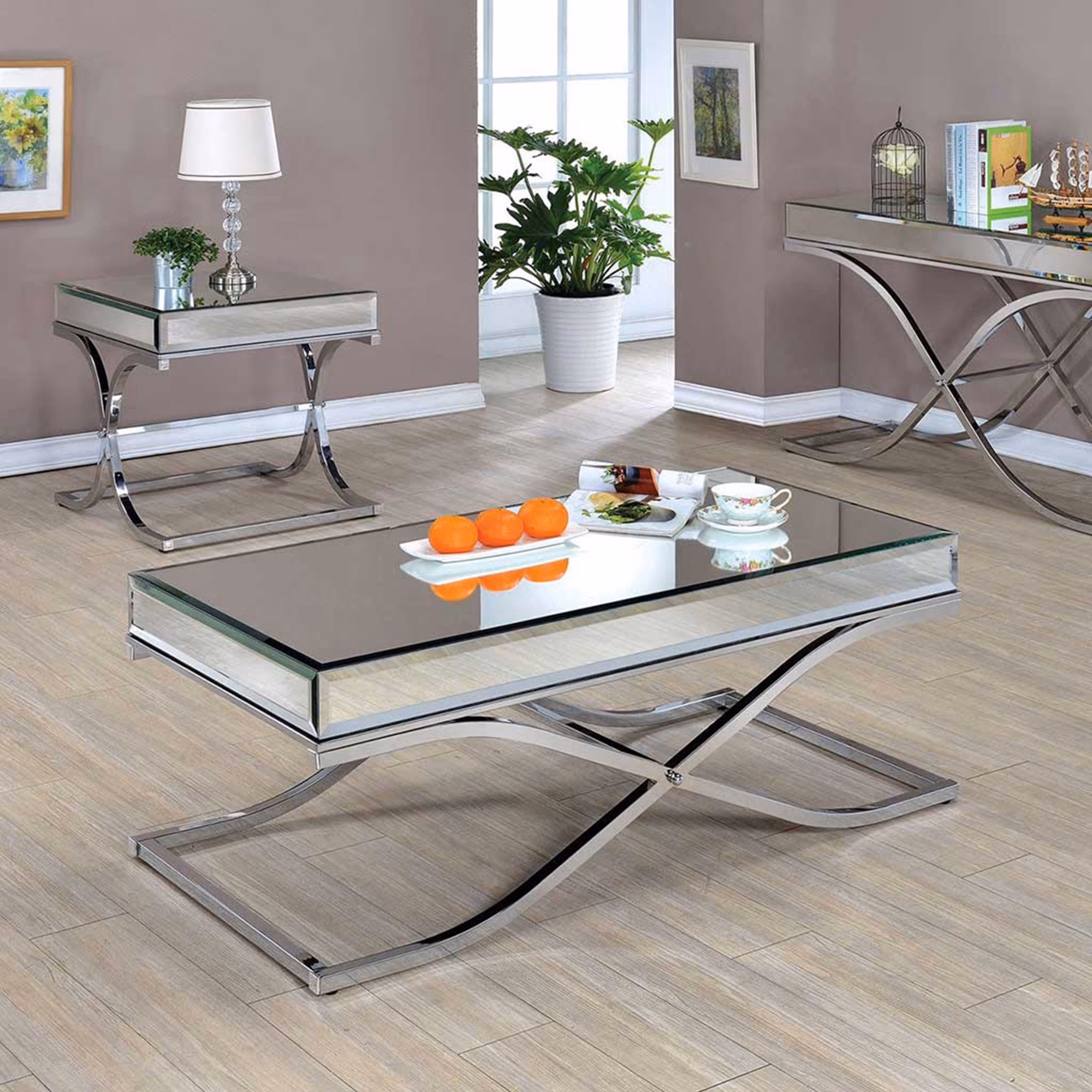 Mirrored coffee table styled in a contemporary living room setting